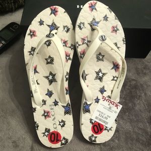 Multi color coach flip flops